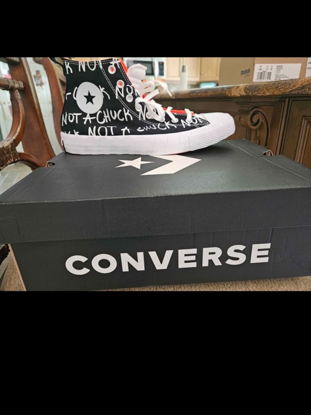 Converse Black & White High-Top Sneakers with 'Not a Chuck' Graphic